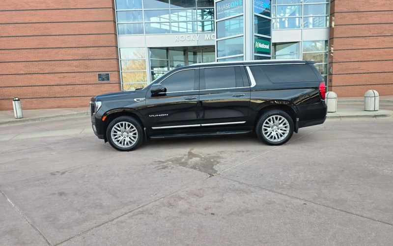 Black luxury SUV in Denver, for Denver Airport to Colorado Springs transfers